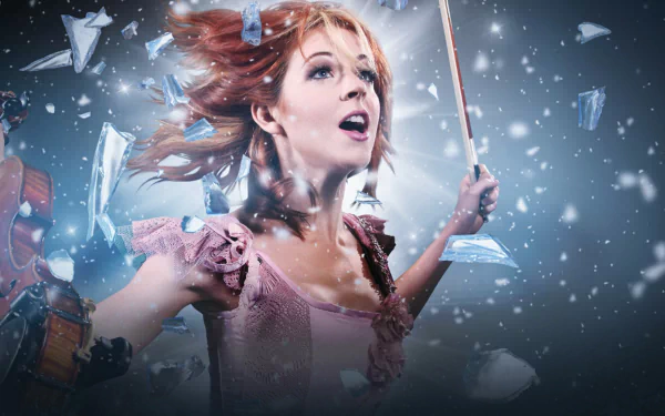 HD PC desktop wallpaper featuring musician Lindsey Stirling playing violin amidst dynamic shards and glowing effects.