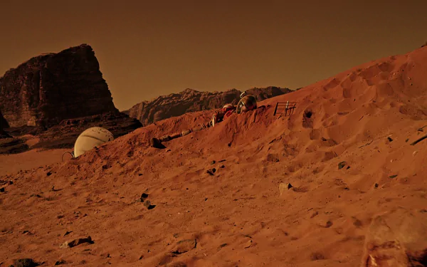 HD desktop wallpaper showcasing a sandy, rocky landscape of a barren planet inspired by the movie The Martian.