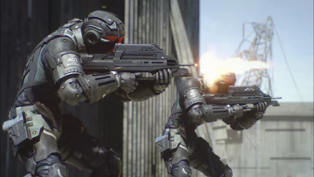 Cyberpunk mecha anime (Appleseed Alpha) — armored troopers firing futuristic rifles in an industrial city; HD PC desktop wallpaper.