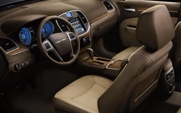 Interior view of a Chrysler 300 luxury vehicle showcasing a brown dashboard and seats in high definition, captured as a PC desktop wallpaper background.