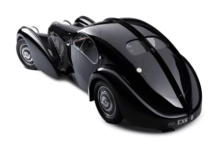 A sleek black Bugatti Type 57 showcased in 4K Ultra HD, highlighting its classic curves and vintage automotive design on a clean background.