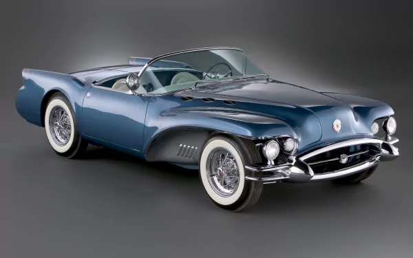 Sleek metallic blue Buick Wildcat II convertible on a neutral studio backdrop, presented as a 4K Ultra HD PC desktop wallpaper and background.