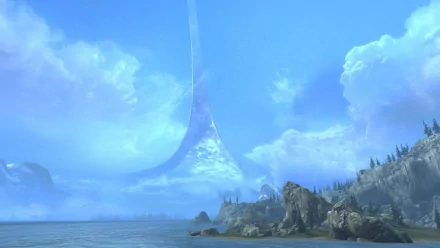 A stunning HD wallpaper from the video game Halo: Reach, featuring a serene beach scene beneath a brilliant blue sky and a massive ring structure in the distance.