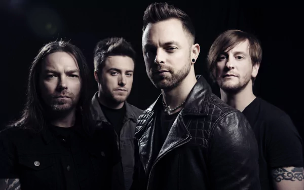 A striking HD wallpaper featuring the band Bullet For My Valentine, highlighting the four members with a dark, moody background that emphasizes their rock aesthetic.