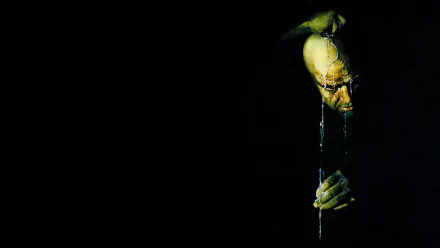 A dramatic wallpaper from the movie Apocalypse Now, featuring a haunting figure with water dripping from its face, surrounded by darkness, creating a stark and intense atmosphere.