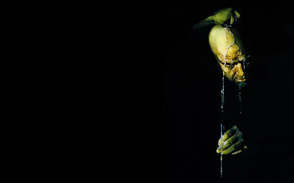 A dramatic wallpaper from the movie Apocalypse Now, featuring a haunting figure with water dripping from its face, surrounded by darkness, creating a stark and intense atmosphere.