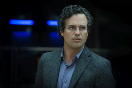 Mark Ruffalo as Bruce Banner in a scene from *Avengers: Age of Ultron*, set against a backdrop that enhances the character's contemplative demeanor. 4K Ultra HD wallpaper.