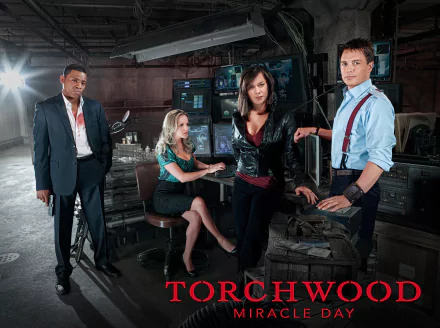 4K Ultra HD desktop wallpaper featuring the main cast of the TV show Torchwood in a high-tech, dimly lit control room setting.