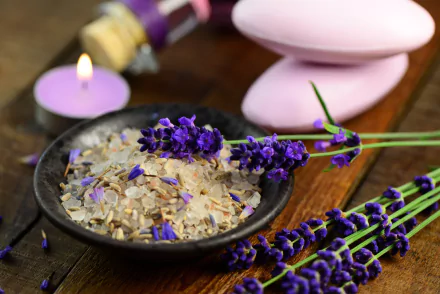 8K Ultra HD still life of lavender sprigs, a bowl of salt, and a lit candle arranged on a wooden surface, evoking a serene spa atmosphere.