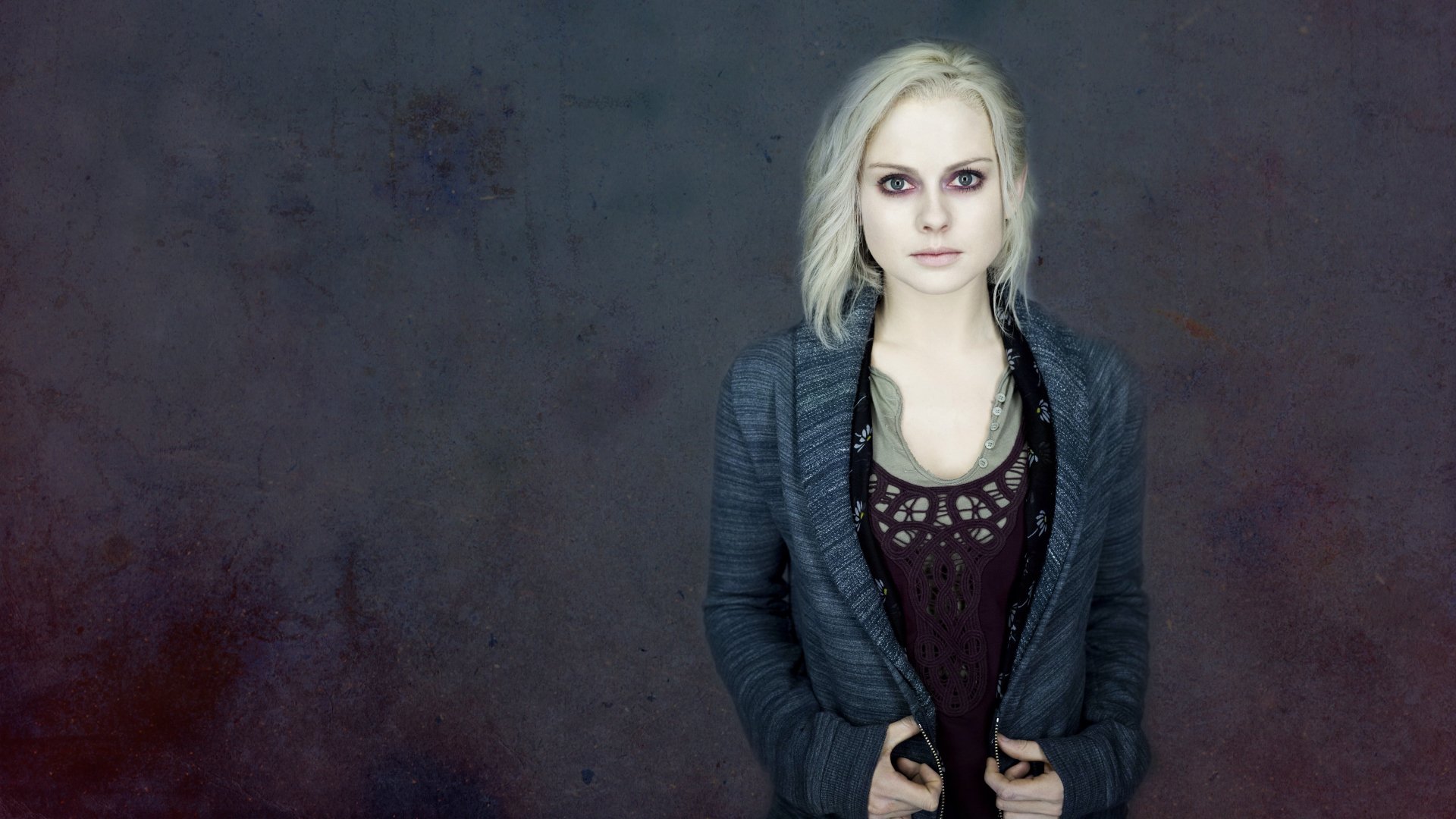 A striking 4K Ultra HD background featuring Rose McIver from the TV show iZombie, showcasing her captivating presence with a moody backdrop.