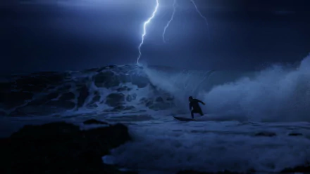 A dramatic HD wallpaper featuring a surfer navigating turbulent waves under a striking lightning storm, capturing the intense spirit of surfing and adventure.