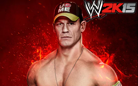 HD wallpaper of John Cena wearing a You Can't See Me hat with a WWE 2K15 logo, set against a fiery background.