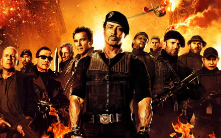 A dramatic HD wallpaper from The Expendables 2, featuring a cast of action stars amidst an explosive backdrop of fire and smoke, showcasing intense camaraderie and adventure.