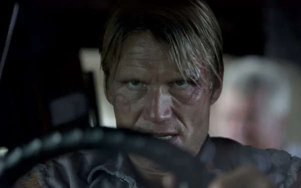 Dolph Lundgren as Gunnar Jensen in a dramatic moment from The Expendables, captured in this striking 4K Ultra HD desktop wallpaper.