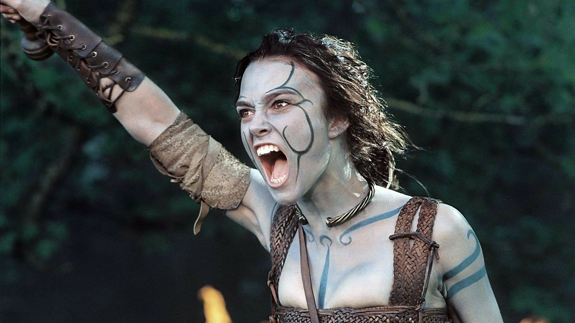 Keira Knightley in character, fierce and battle-ready, from the movie King Arthur, featured in a high-definition PC desktop wallpaper.