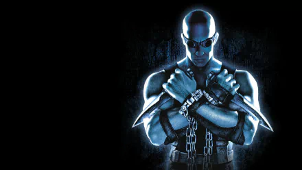 HD PC desktop wallpaper featuring Vin Diesel as Riddick from the video game The Chronicles of Riddick: Escape from Butcher Bay, holding curved knives with chains.