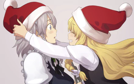 HD PC desktop wallpaper of Touhou's Marisa Kirisame (blonde, blue-eyed) playfully adjusting a Santa hat on white-haired Sakuya Izayoi; anime Christmas gaming scene.