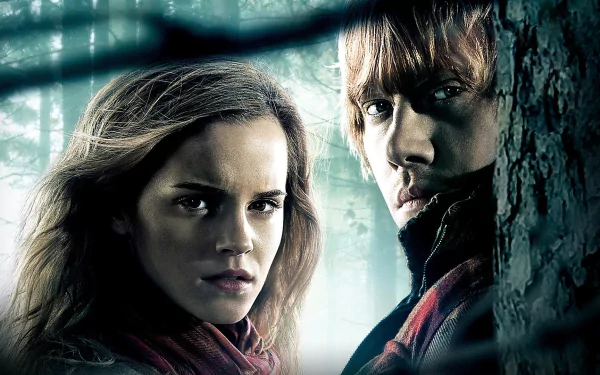 A highly detailed HD wallpaper featuring Ron Weasley and Hermione Granger from Harry Potter and the Deathly Hallows: Part 1, captured in a dramatic forest setting.