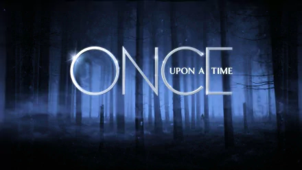 A mystical forest serves as the backdrop for the logo of the TV show Once Upon A Time, featuring bold, glowing text that encapsulates the enchanting storytelling theme.