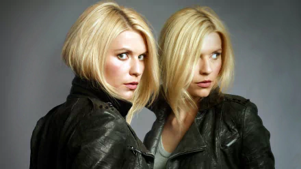 HD desktop wallpaper featuring Claire Danes from the TV show Homeland, showcasing her in a leather jacket with a reflective, intense expression.