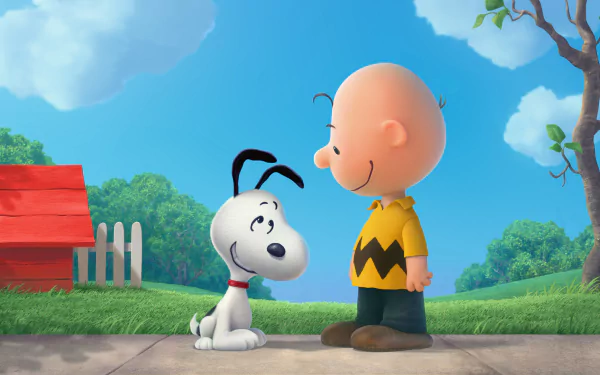 Charlie Brown and Snoopy stand happily together in a vibrant scene from The Peanuts Movie, showcasing their friendship against a bright, cheerful background.