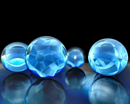 An abstract composition featuring translucent blue spheres on a reflective surface, creating a captivating visual for HD PC desktop wallpaper and backgrounds.