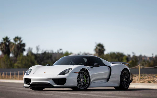 White Porsche 918 Spyder supercar — a high-performance vehicle parked on a sunlit road, rendered as a sharp 4K Ultra HD PC desktop wallpaper and background.