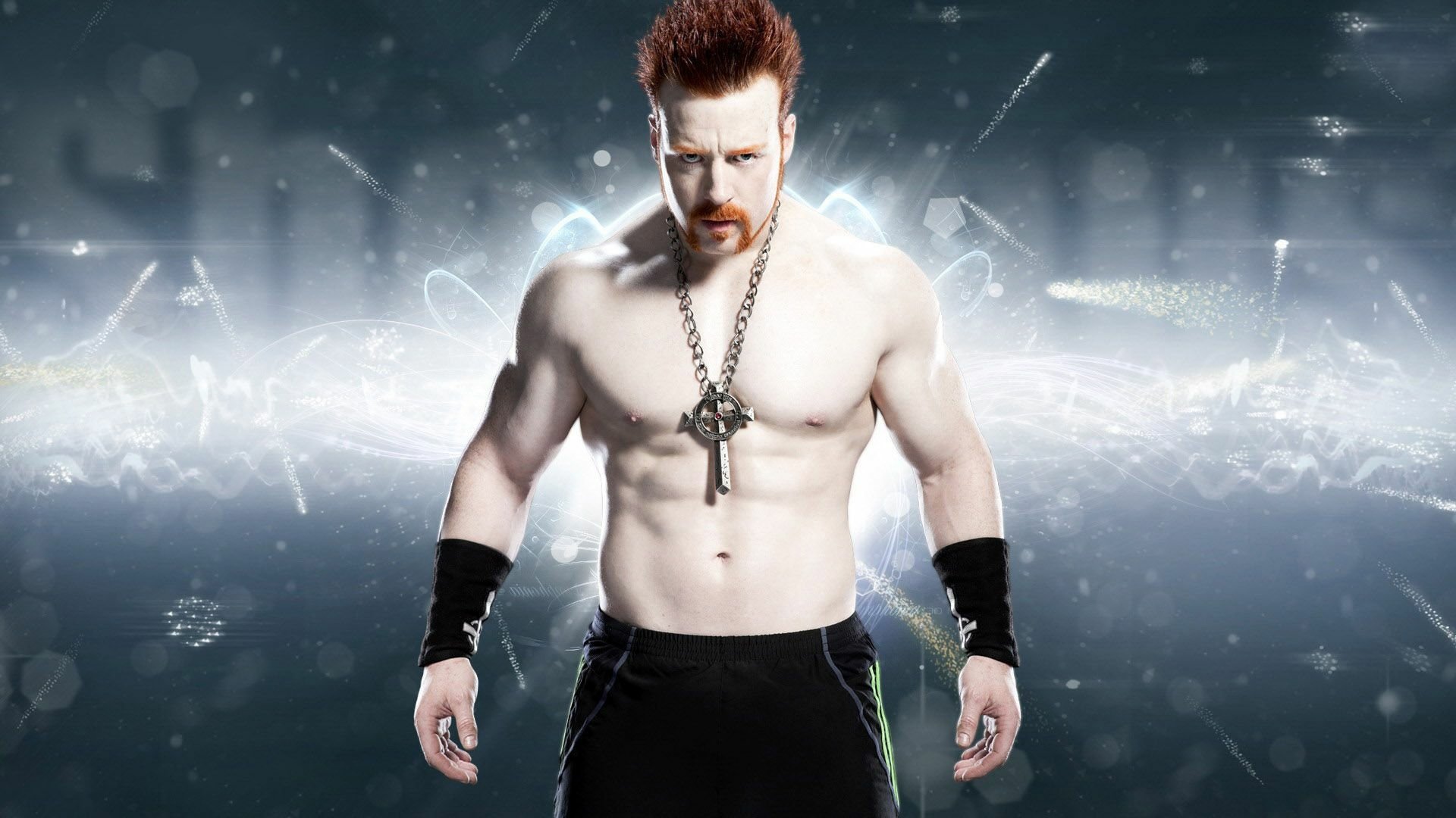 WWE wrestler stands confidently with spark effects on a dark background, used as an HD desktop wallpaper.