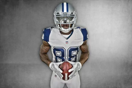 Dallas Cowboys football player in #88 uniform holding a football against a textured gray backdrop — 2K Quad HD PC desktop wallpaper and sports background.