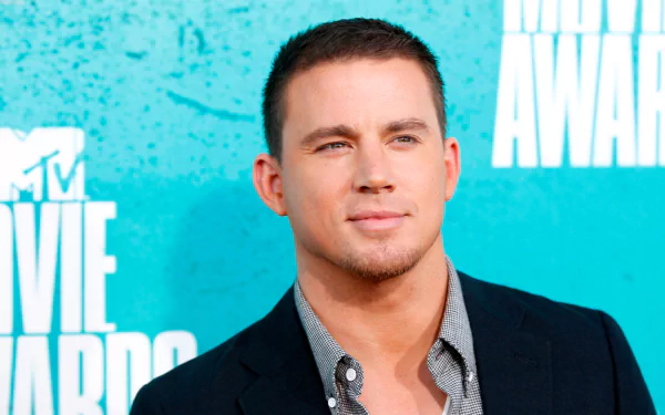 HD desktop wallpaper featuring American actor and celebrity Channing Tatum against a blue MTV Movie Awards backdrop.
