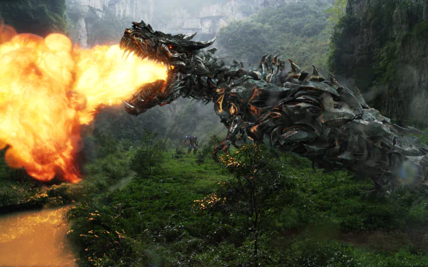 A striking HD wallpaper from *Transformers: Age of Extinction*, featuring a metallic dragon unleashing flames in a lush, green landscape, blending action and fantasy elements.