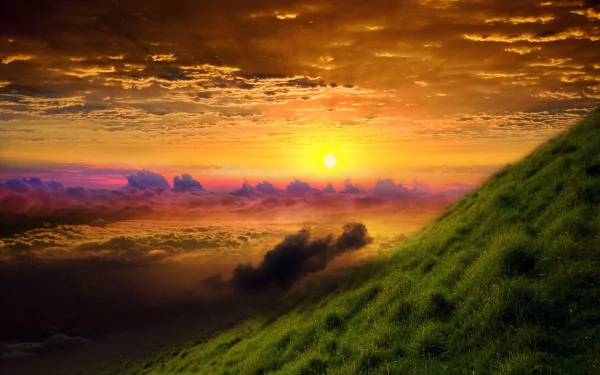 A breathtaking sunrise illuminates a mountainous landscape in China, with vibrant skies and clouds above a lush green hill, capturing the serene beauty of nature in HDR detail.