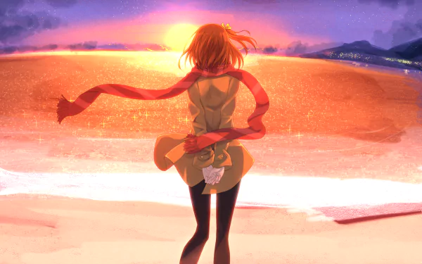 HD PC desktop wallpaper featuring Honoka Kousaka from Love Live! standing on a beach at sunset, with vibrant orange and purple hues illuminating the sky and ocean.