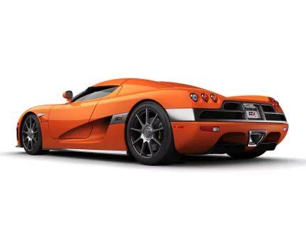 A sleek orange Koenigsegg CCX showcases its aerodynamic design and distinctive features, making a striking HD PC desktop wallpaper and background.