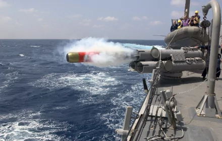  A MK-46 exercise torpedo is launched from the deck of the guided-missile destroyer USS Mustin (DDG 8 by John L. Beeman