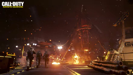 A dramatic scene from Call of Duty: Infinite Warfare, featuring soldiers advancing through a fiery, industrial landscape, captured in stunning 4K Ultra HD for desktop use.
