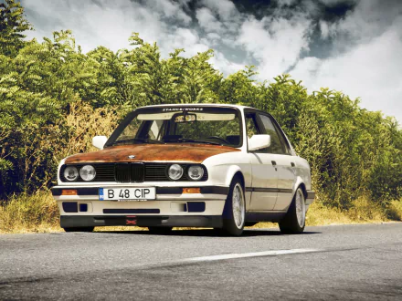 HD PC desktop wallpaper featuring a classic BMW 3 Series parked on a road with greenery and a cloudy sky in the background.