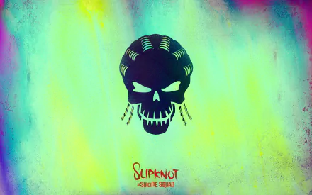 A vibrant HD wallpaper featuring the Slipknot logo from DC Comics' Suicide Squad, showcasing a striking skull design against a colorful background.