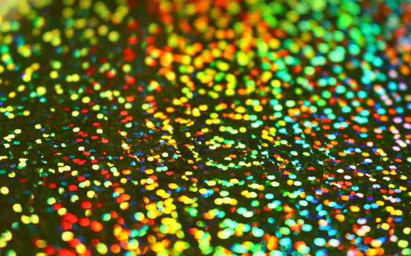 Vibrant abstract glitter pattern with a spectrum of colors, rendered in stunning 4K Ultra HD for a dazzling PC desktop wallpaper background.