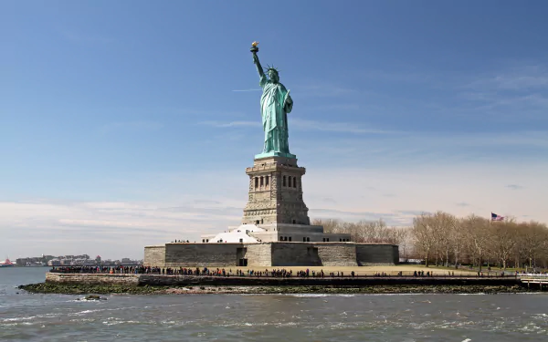  Statue of Liberty is a colossal neoclassical sculpture on Liberty Island in New York Harbor by MonicaVolpin