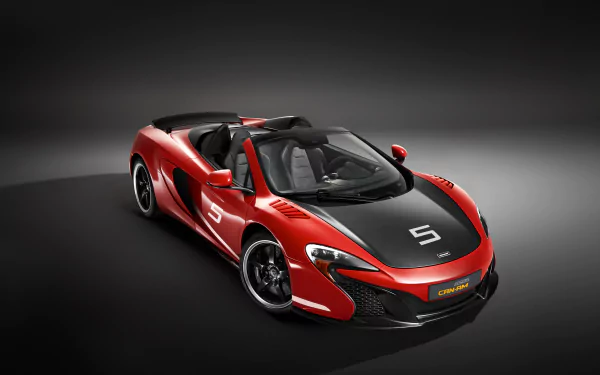 Red McLaren 650S Spider supercar showcased on a dark backdrop, captured in 4K Ultra HD for a striking PC desktop wallpaper background.