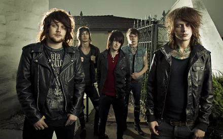 A striking HD wallpaper featuring the band Asking Alexandria, led by Denis Stoff, showcasing their rock style in leather jackets against a moody backdrop.