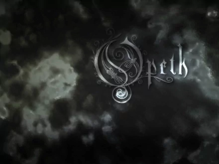 HD PC desktop wallpaper featuring dark, smoky textures with the stylized Opeth logo, capturing the atmospheric essence of the band's music.