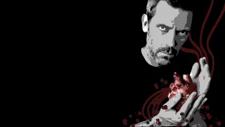 HD PC desktop wallpaper from a TV show: intense medical-drama doctor holds a stylized bleeding heart against a stark black background.
