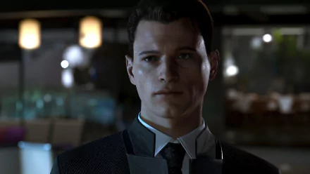Connor from Detroit: Become Human stands in a detailed HD PC desktop wallpaper, showcasing the game's striking visuals in a dramatic scene.