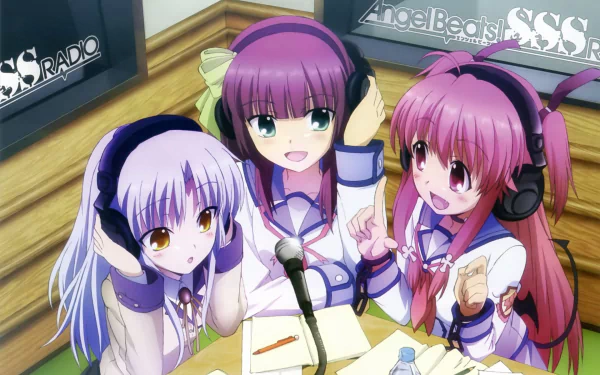 Three characters from Angel Beats!—Yui, Yuri Nakamura, and Kanade Tachibana—record a radio show in this vibrant HD desktop wallpaper.
