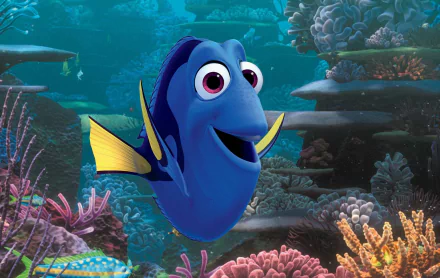 Bright HD desktop wallpaper featuring Dory from Finding Dory, showcasing her joyful expression amidst a vibrant underwater scene filled with colorful coral and marine life.