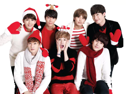 HD desktop wallpaper of Super Junior members dressed in festive holiday attire, posing together with playful expressions.