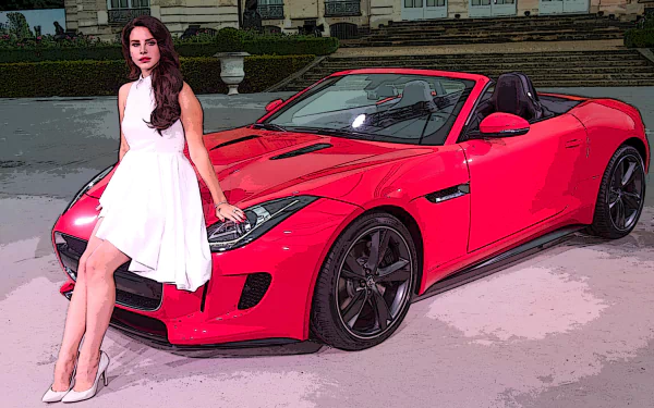 Lana Del Rey, also known as Lizzy Grant, poses in a white dress next to a red convertible car in this HD PC desktop wallpaper.