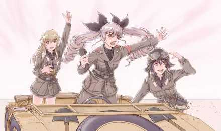 Three animated characters from *Girls und Panzer* cheerfully pose on a tank, showcasing their distinct hairstyles and uniforms, set against a vibrant backdrop.